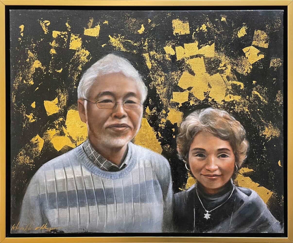 Double portrait with splattered gold on a dark ground.