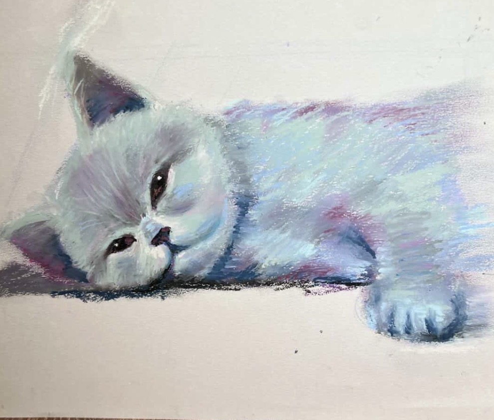 Soft pastel painting of a pale kitten lying on its side.